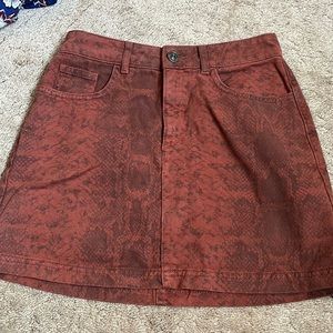 Red snakeskin jean skirt